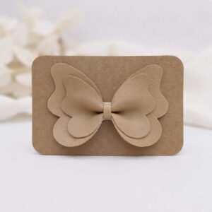 Barrette papillon rose camel