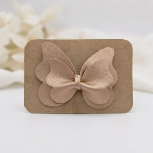 Barrette papillon rose gold métalisé