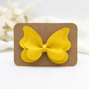Barrette papillon jaune